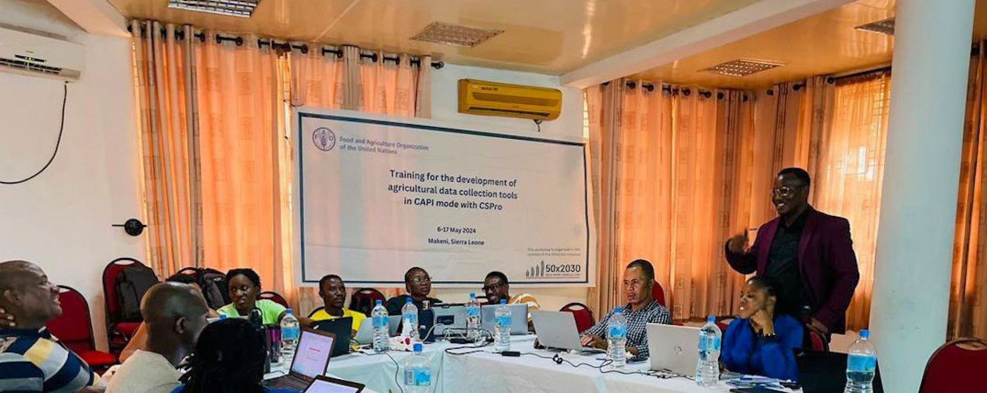 Government officials and 50x2030 team at a workshop