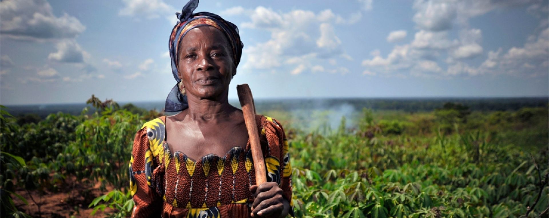 Woman standing in front of crops