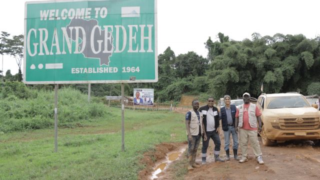 Surveyers in field
